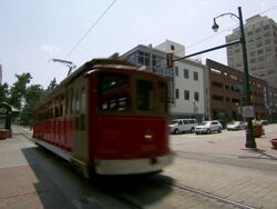 WS Tram train moving toward in city / Memphis, Tennessee, United States Stock Footage