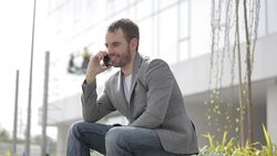 Positive businessman Using phone Stock Footage