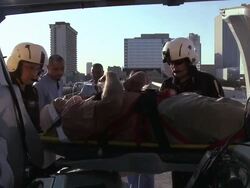 Nurses taking patient from helicopter to the hospital  Stock Footage