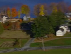 WS ARIEAL DS View of Enfield Shaker museum and outdoor village / New Hampshire, United States Stock Footage