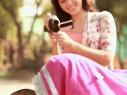 Young woman talking video of two rural women near handpump, Haryana, India Stock Footage