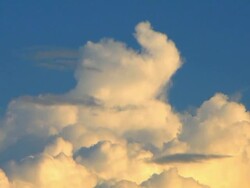 Cumulus clouds at sunset Stock Footage