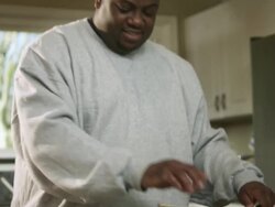 MS TU TD Dad plates and eating egg / Dallas, Texas, USA Stock Footage