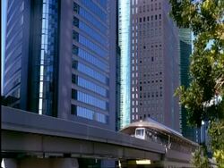 WA shiodome buildings and Yurikamome line, Tokyo, Japan Stock Footage