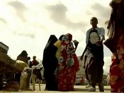 People walking by street vendors Stock Footage