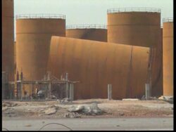 INDIA: KANDLA: OFFICIALS TRY TO REPAIR DAMAGE CAUSED BY CYCLONE News Clip