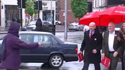 Campaigner Hands Corbyn 'Vote Labour' Leaflet News Clip