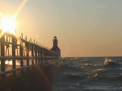 Lighthouse with Sun and Surf Stock Footage