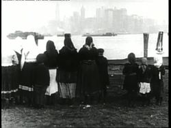 Immigrants view the Manhattan skyline from Ellis Island. News Clip