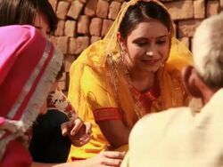 Three young women at pottery wheel in a village, Haryana, India Stock Footage