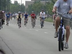 WS Bike traffic on Lake Shore Drive in Chicago on summer morning during community cycling event / Chicago, Illinois, USA Stock Footage