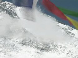 MS CS Colorful prayer flags blowing in  wind at Mt. Everest Stock Footage
