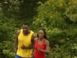 Male and Female Athletes Run Toward Camera Stock Footage