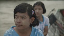 W/S Burmese teenage girls in a motorboat Stock Footage