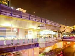 Bangkok Downtown Rush hour with sky train Time lapse night Stock Footage