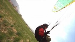 HD Super Slow-Mo: Parachutist Landing Stock Footage