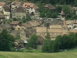 AERIAL View of old town and fields, Ronainmotier, Vaud, Switzerland Stock Footage