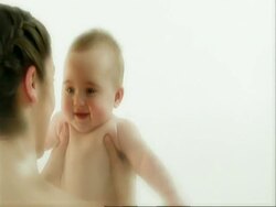 CU mother and baby cuddling Stock Footage