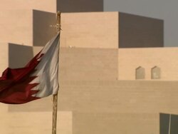 MS PAN Museum of Islamic Art and national flag / Doha, Qatar  Stock Footage