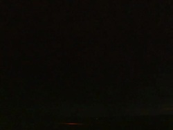 Bright lightning branches across sky and clouds before striking ground. Forked lightning. Stock Footage