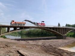 Bridge construction site, preparing demolition of old bridge, Saar river, Wiltingen, Germany / Wiltingen, Rhineland Palatinate, Germany Stock Footage