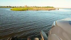 With car on raft over the bay in Moscitia Stock Footage