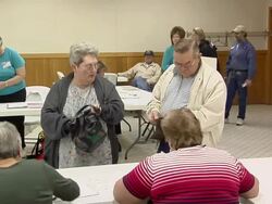 MS, People registering at polling place, New Knoxville, Ohio, USA Stock Footage