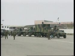 ALBANIA:  MULTINATIONAL SECURITY MISSION: ARRIVAL OF TROOPS UPDATE (3) News Clip