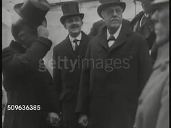 1921/1922: INTERNATIONAL CONFERENCE ON NAVAL LIMITATION: British Prime Minister Lord Balfour (1848-1930) standing w/ others. French Prime Minister Aristide Briand (1862-1932) standing w/ others smoking. Instructional Video