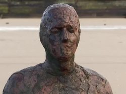 Antony Gormley's Another Place Art work on Crosby Beach News Clip