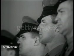 1938: HIGHWAY PATROLMEN: CU Patrolmen standing for inspection. ASKING FOR TICKET FIXING: Male hands holding traffic ticket w/ business card & note attached.   Illegal, criminal, felony conspiracy, obstruction of justice, official misconduct. Instructional Video