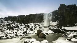 4K Time-lapse: Oxararfoss Waterfall winter Pingvellir National Park Iceland Stock Footage