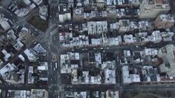 Aerial view looking down at Washington Square Park and the streets and rooftops of Greenwich Village. Stock Footage
