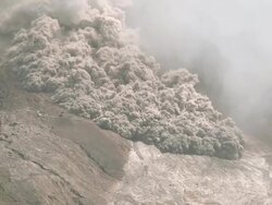 Fast Moving Pyroclastic Flow Sweeps Down Sinabung Volcano Stock Footage
