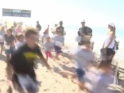 ATMOSPHERE: Kids at Tot Trot start at 26th Annual Nautica Malibu Triathlon Stock Footage