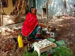 Woman roasting coffee grains for coffee ceremony Stock Footage