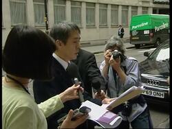 Vigil a year after of death of 58 Chinese immigrants in truck. News Clip