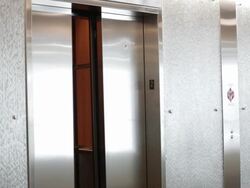  MS Businesswoman walking out of elevator / Seattle, Washington, United States Stock Footage