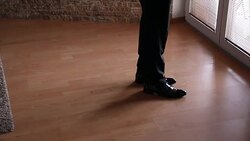 Man in black shoes walking Stock Footage