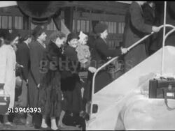 1953: TEMPELHOF AIRPORT: BERLIN, GERMANY: EXT VS Various refugees, men, women, children, families, lining up, walking up stairs, boarding airplane at Tempelhof Airport. Instructional Video