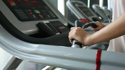 sport women running on treadmill cardio equipment Stock Footage