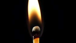Igniting Matchstick Stock Footage