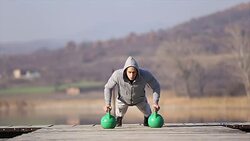 Push-ups by the lake Stock Footage