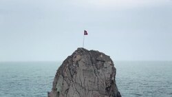 Flapping flag of Turkey on a rock at the Black Sea Coast in Northern Turkey. Stock Footage