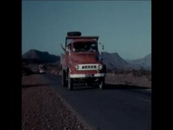 SYND 26 10 75 CONVOY OF TRUCKS TAKING MARCHERS TO SPANISH SAHARA DESERT News Clip