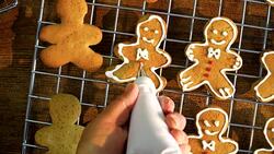 Decorating Christmas Cookies with Icing Stock Footage