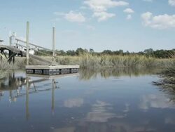 WS SLO MO POV boat traveling on marsh river / Charleston, South Carolina, USA Stock Footage