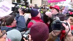 Protest Against Trump Inaugeration - Police Guard and Protestors Sit Down News Clip