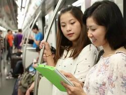 Young woman using smartphone in Yuyuan Tourist Mart Stock Footage