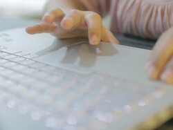 woman Typing at Keyboard,Dolly shot Stock Footage